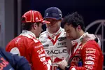 Foto zur News: Charles Leclerc (Ferrari), Max Verstappen (Red Bull) und Sergio Perez (Red Bull)