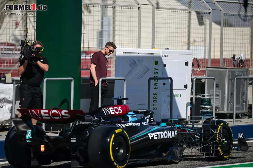 Foto zur News: Nico Hülkenberg (Haas) und George Russell (Mercedes)