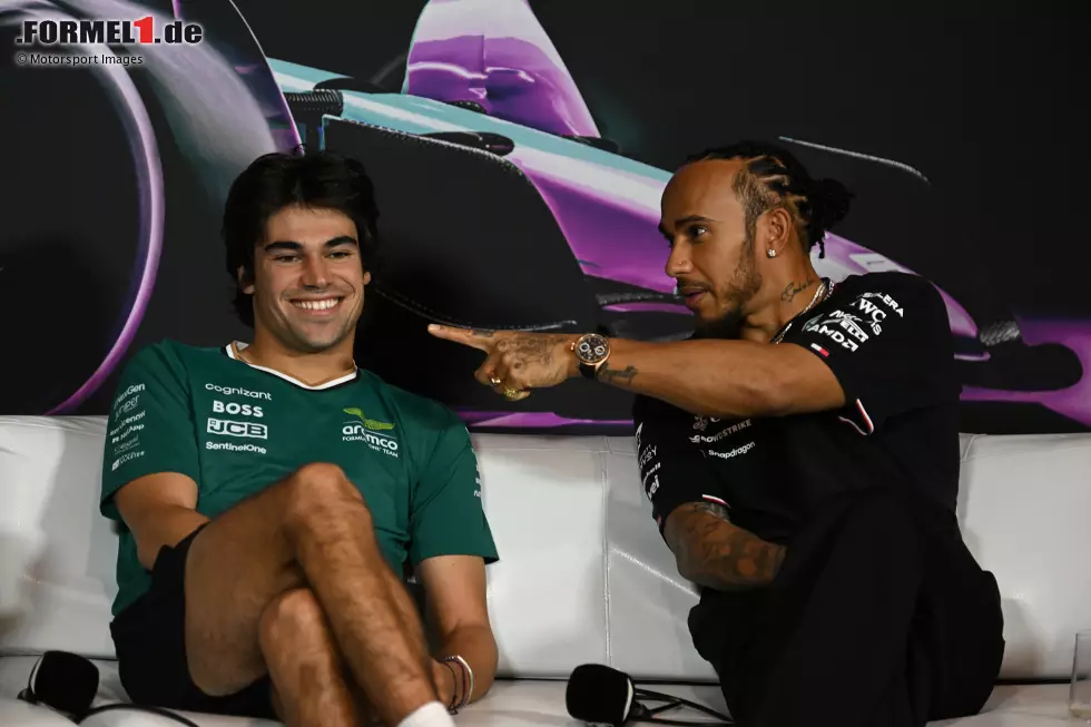 Foto zur News: Lance Stroll (Aston Martin) und Lewis Hamilton (Mercedes)