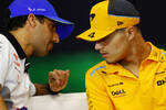 Foto zur News: Daniel Ricciardo (Racing Bulls) und Lando Norris (McLaren)