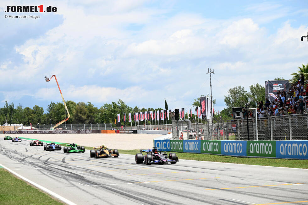 Foto zur News: Esteban Ocon (Alpine), Lando Norris (McLaren) und Valtteri Bottas (Sauber)