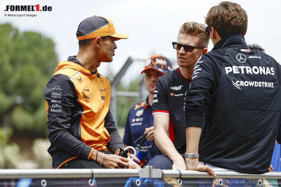 Foto zur News: Lando Norris (McLaren), Nico Hülkenberg (Haas) und George Russell (Mercedes)