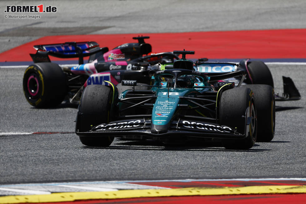 Foto zur News: Lance Stroll (Aston Martin) und Esteban Ocon (Alpine)