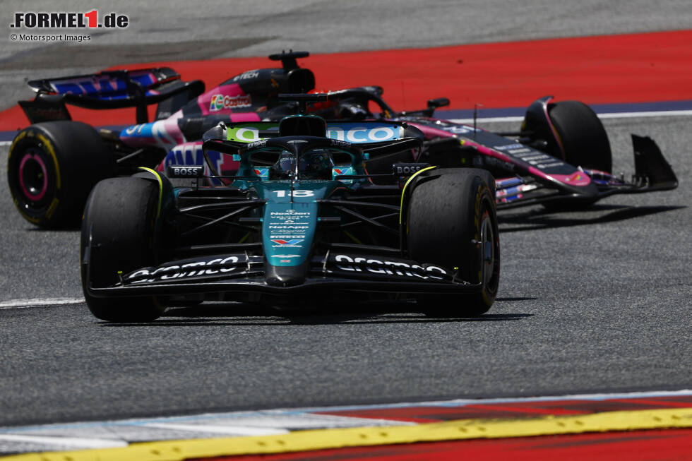 Foto zur News: Lance Stroll (Aston Martin) und Esteban Ocon (Alpine)