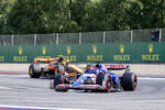 Foto zur News: Daniel Ricciardo (Racing Bulls) und Lando Norris (McLaren)