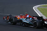 Foto zur News: Carlos Sainz (Ferrari) und George Russell (Mercedes)