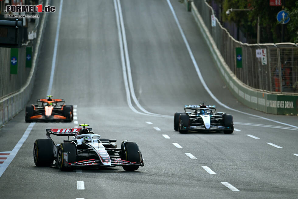 Foto zur News: Nico Hülkenberg (Haas), George Russell (Mercedes) und Lando Norris (McLaren)