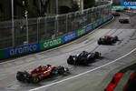 Foto zur News: Sergio Perez (Red Bull), Yuki Tsunoda (Racing Bulls) und Carlos Sainz (Ferrari)