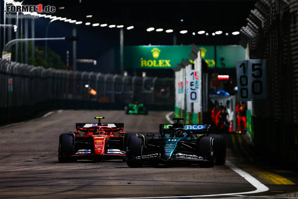 Foto zur News: Lance Stroll (Aston Martin) und Carlos Sainz (Ferrari)