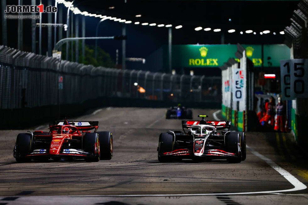 Foto zur News: Charles Leclerc (Ferrari) und Nico Hülkenberg (Haas)