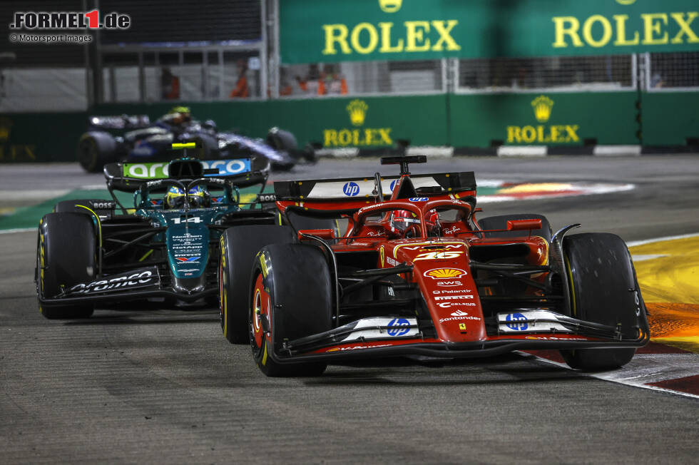 Foto zur News: Charles Leclerc (Ferrari) und Fernando Alonso (Aston Martin)