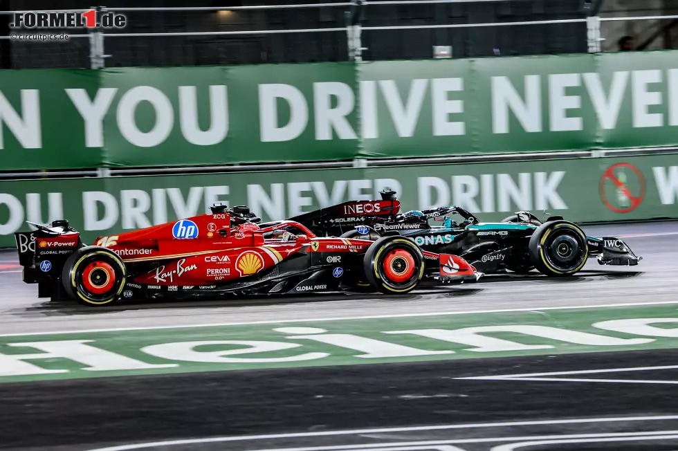 Foto zur News: Charles Leclerc (Ferrari) und George Russell (Mercedes)