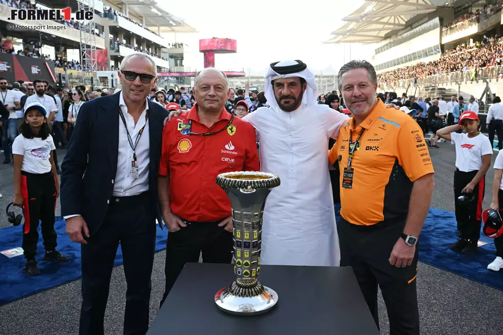 Foto zur News: Stefano Domenicali und Zak Brown