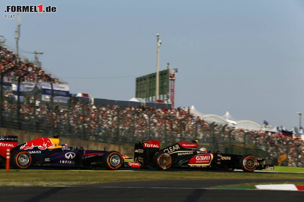 Foto zur News: ... und auf seiner Lieblingsstrecke in Suzuka folgt Nummer fünf - nach hartem Kampf, unter anderem gegen Lotus-Renault-Pilot Romain Grosjean. Am Saisonende 2013 steht er bei neun Siegen in Serie. Das ist bis heute Rekord!