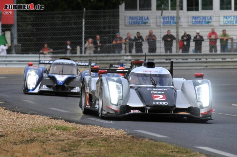 Foto zur News: 2011 erarbeitet sich Andre Lotterer endgültig den Ruf, einer der schnellsten LMP1-Piloten zu sein. Dem starken Druck von Peugeot hält der Deutsche in beeindruckender Manier stand und sichert sich und seinen Audi-Kollegen 2011 mit 13 Sekunden Vorsprung den Sieg bei den 24 Stunden von Le Mans.