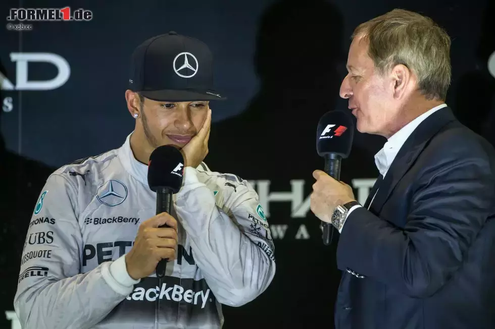 Foto zur News: Ex-Grand-Prix-Pilot Martin Brundle führt das erste Interview mit dem neuen Weltmeister. Der stammelt nur: &quot;Mir fehlen die Worte.&quot;