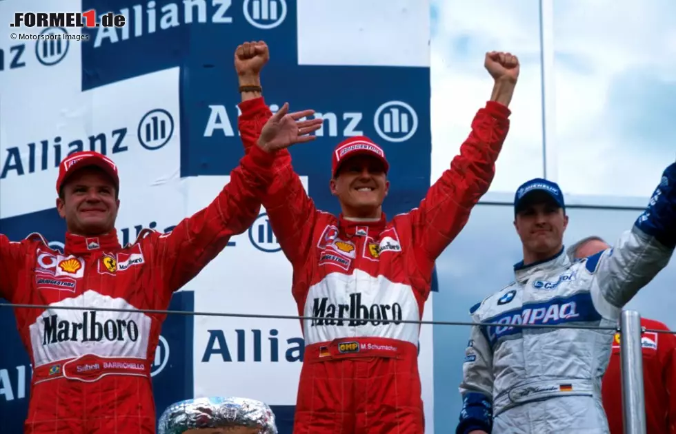 Foto zur News: 2002 (als San-Marino-Grand-Prix): Michael Schumacher (Ferrari) vor Rubens Barrichello (Ferrari) und Ralf Schumacher (Williams)