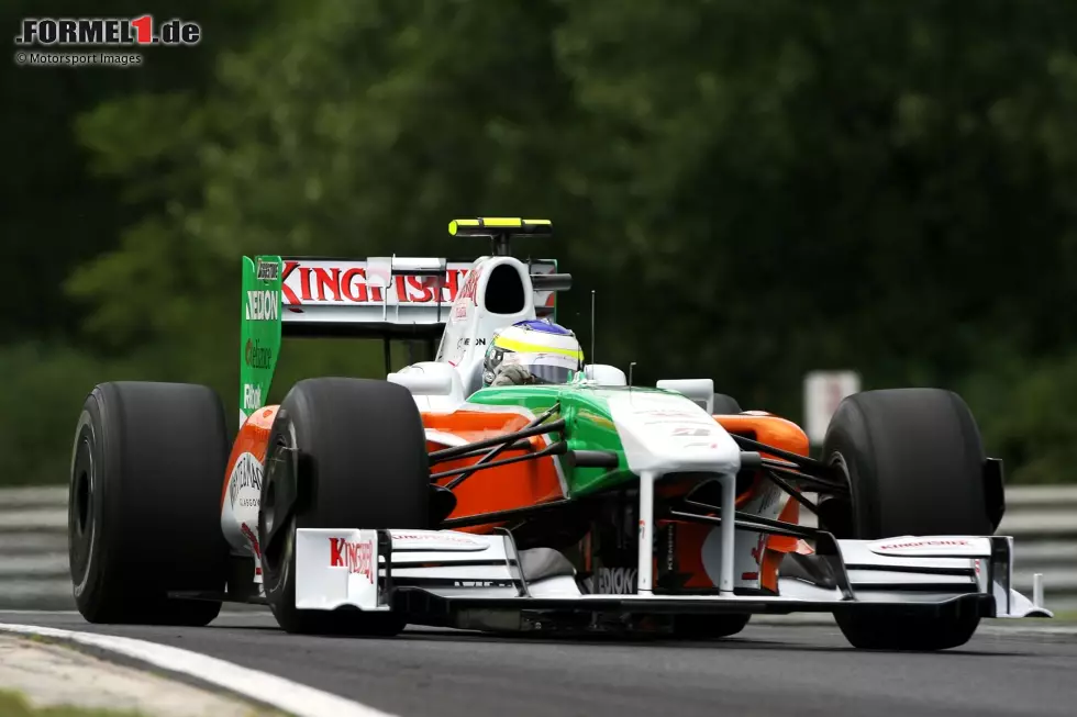 Foto zur News: 2009: Beim Belgien-Grand-Prix trumpft Giancarlo Fisichella als Stammfahrer von Force India noch richtig auf und fährt von der Poleposition zu Platz zwei hinter Kimi Räikkönen im Ferrari, aber schon ...