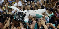 Foto zur News: Freudentanz und Handshake: Weltmeister Rosberg im Rausch