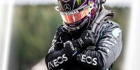 Foto zur News: Für guten Zweck: Lewis Hamilton versteigert signierte WM-Handschuhe