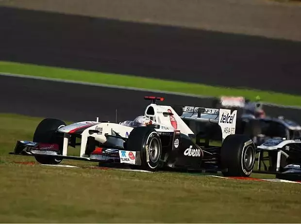 Foto zur News: Suzuka: Button besiegt den neuen Weltmeister!