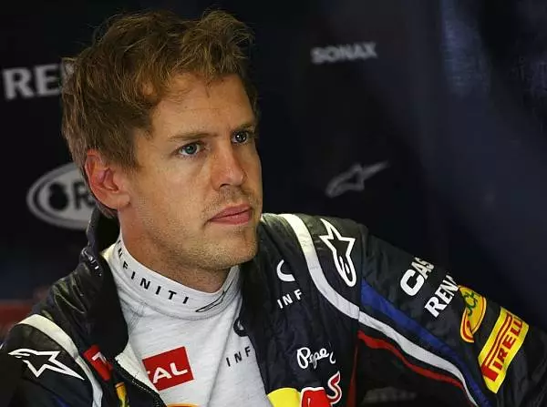 Foto zur News: Vettel: "Schade für die Leute, die im Regen sitzen"